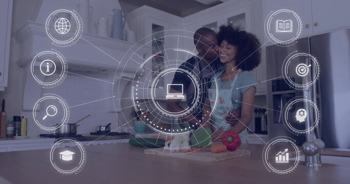 Animation of african american couple in love in kitchen and icons with data processing