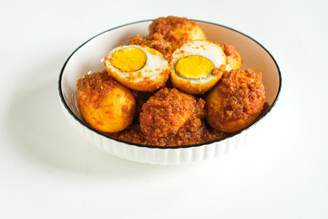 telur balado or spicy egg is traditional popular food made from boiled egg with tomato and paste chili or sambel