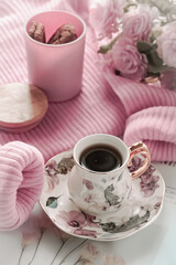 still life a cup of tea, sweater and flower
