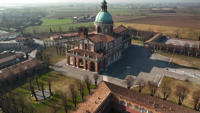 Aerial revealing shot of Santa Maria del Fonte Sanctuary in the town of Caravaggio in Lombardy Region | Italy