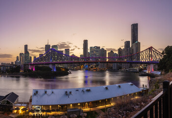 Fototapeta na wymiar The Iconic Story Bridge at dusk on the Brisbane river in Queensland, Australia