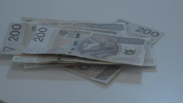 Two hunder polish money banknote put on stack of banknote