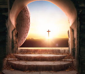 Easter and Good Friday concept, Empty tombstone with cross on mountain sunrise background