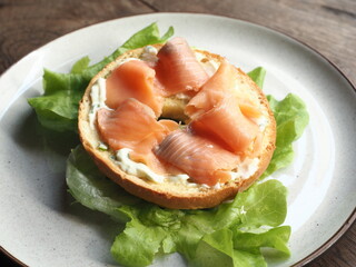 smoked salmon cream cheese bagel with lettuce