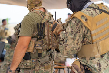 Team of U.S. Army marine corps soldier military war with gun weapon participating and preparing to attack the enemy in Thailand during exercise Cobra Gold training in battle. Combat force.