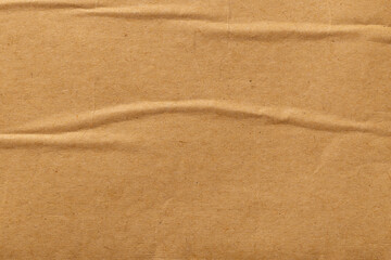 Fototapeta na wymiar Brown color eco recycled kraft paper sheet texture cardboard background.