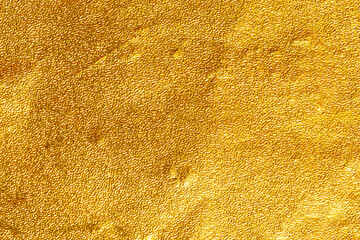 Gold paper sheet texture cardboard background.