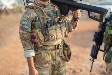 Team of U.S. Army marine corps soldier military war with gun weapon participating and preparing to...