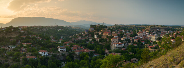Obraz premium Panoromic old Safranbolu houses at sunset time. Houses on the UNESCO World Heritage List. Turkey travel destinations. Safranbolu, Karabuk, Turkey