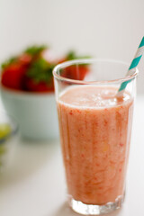 homemade strawberry smoothie in a glass
