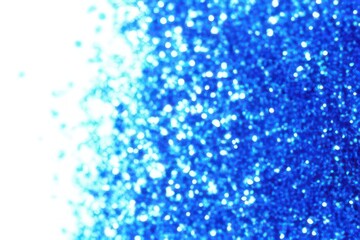 blue background with gradient, bokeh and sparkles on blue background