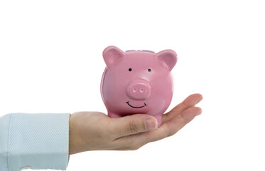 Woman hand holding a piggy bank
