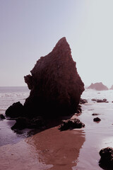 rock in the sea of El Matador Beach