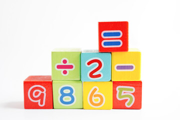 Number wood block cubes for learning Mathematic, education math concept.