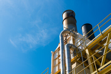 oil refinery tower on offshore platform.