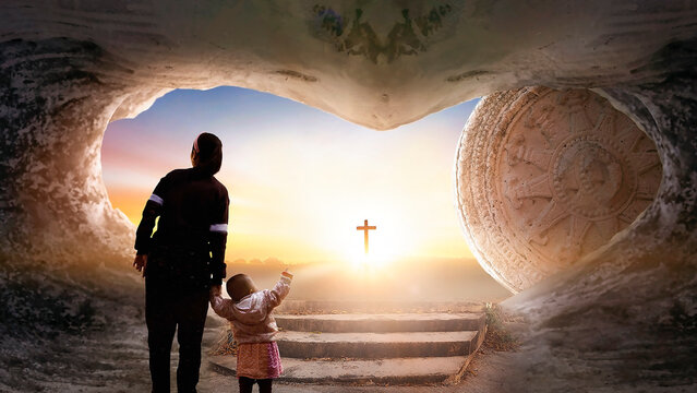 Easter and Good Friday concept, Mom and child standing with empty tomb of Jesus Christ at cross on sunset background