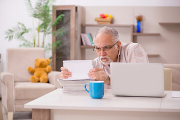 Old male boss employee working from home