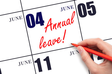 Hand writing the text ANNUAL LEAVE and drawing the sun on the calendar date June 4