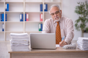 Old male employee and too much work in the office