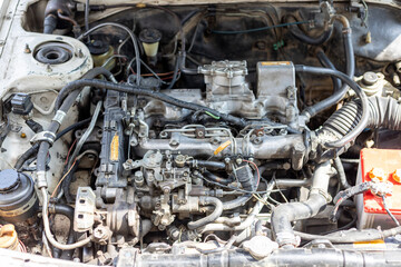 Old diesel engine repair work in a garage