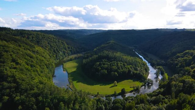 Aerial view of Ardennes with beautiful blue sky in France tracking wide shot 