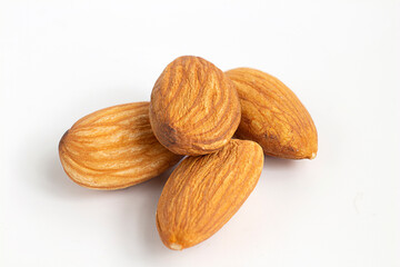 Raw Organic almonds on rustic wood table.Top view