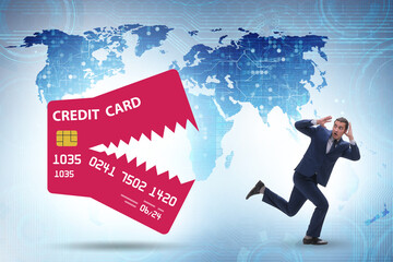 Businessman in credit card debt concept
