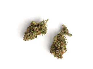 herbal organic medicine CBD oil and medical cannabis bud on white background.