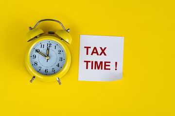 Tax time sticky with alarm clock