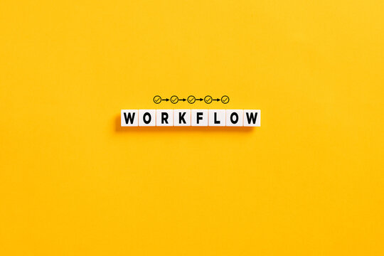 White letter blocks on yellow background with the word workflow. Business workflow and organization process