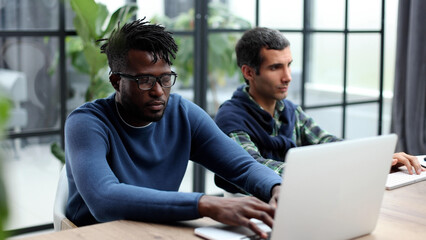 african white colleagues working together use pc corporate apps, mentor teach new employee