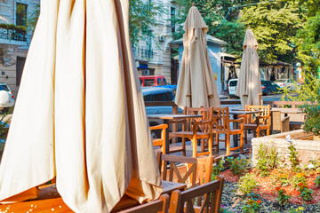 Summer Street Open Air Cafe Interior in Comfortable Green City Park Decorated With Flowers