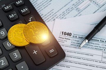 Bitcoin coin with 1040 tax form