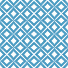 Tiled watercolor pattern. Blue symmetrical kaleidoscope background. Hand painted tiled watercolor seamless. Textile ready mind-blowing print, swimwear fabric, wallpaper, wrapping.