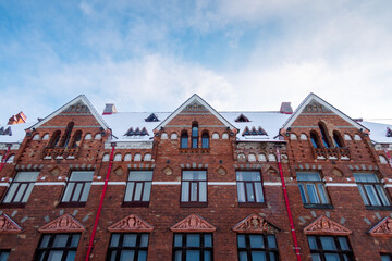 Fototapeta na wymiar Facade view of red brick Bank of Finland building at Market Square, Vyborg, Russia. High quality photo