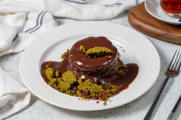 Chocolate cake with liquid chocolate sauce.