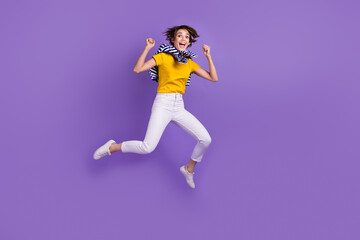 Fototapeta na wymiar Full length photo of adorable cheerful lady wear stylish clothes celebrate sale low prices empty space isolated on purple color background