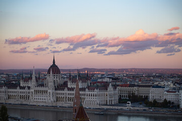 Fototapeta premium Budapest parliament in magic sunset, and the Danube river, Hungary