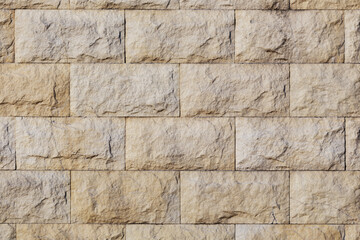 Part of the wall is made of natural stone with a texture.Background is made of fir brick.
