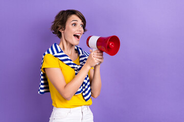 Photo of cheerful excited lady wear stylish tied striped clothes look empty space share good news...