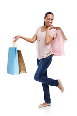 Portrait, shopping bags and woman with fashion on an isolated and transparent png background. Discount celebration, sales deal and happy girl customer pleased after buying at mall