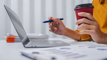 Young Serious asia people bookkeeper doing bookkeeping entrepreneur small business owner accountant...