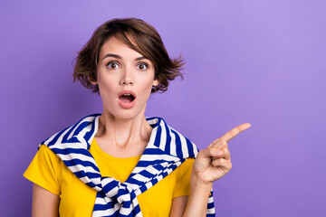 Photo of positive impressed lady dressed tied jumper showing finger empty space isolated violet...