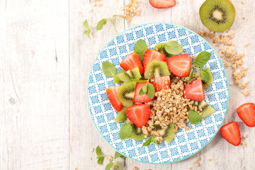 oatmeal- granola with strawberry and kiwi