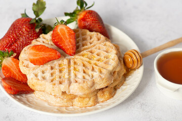 Belgian waffles with strawberries. Food for valentine's day