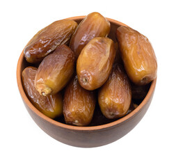 Dates in a cup on a white isolated background