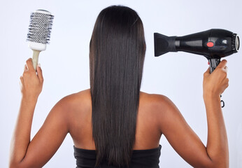 Brush, hair dryer or back of woman in studio for keratin growth, healthy natural shine or wellness....