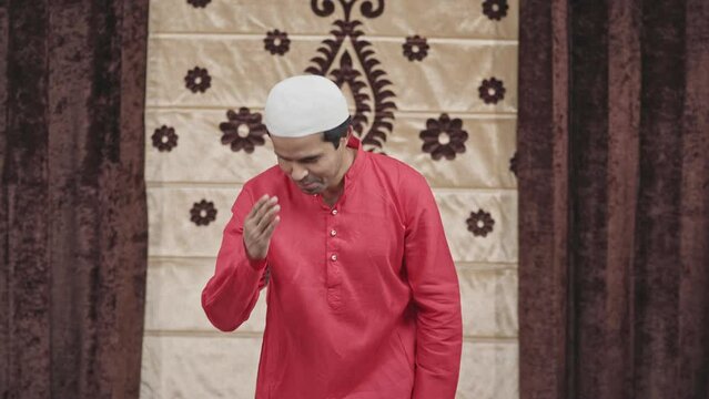 Muslim man greeting and doing adaab to everyone