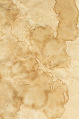 Fototapeta premium Old brown wrinkled paper coffee stains, dirty paper texture, coffee paper on the background.