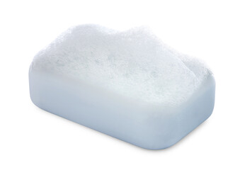 Soap bar with fluffy foam on white background